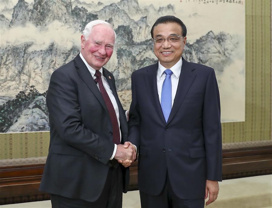 Chinese Premier Li Keqiang (R) meets with Canadian Governor General David Johnston in Beijing, capital of China, July 13, 2017. [Photo/Xinhua]