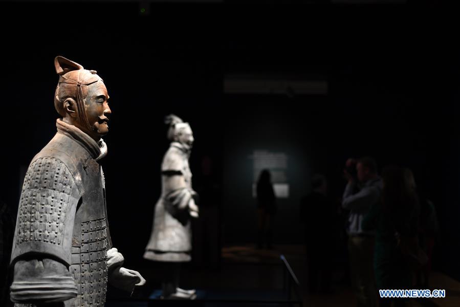 People view terracotta warriors during a press preview at the Virginia Museum of Fine Arts (VMFA) in Richmond, Virginia, the United States, on Nov. 15, 2017. Titled &apos;Terracotta Army: Legacy of the First Emperor of China,&apos; the exhibition features more than 130 artifacts, including 10 life-size terracotta warriors. The exhibition will be at VMFA from Nov. 18 to March 11, 2018. (Xinhua/Yin Bogu) 