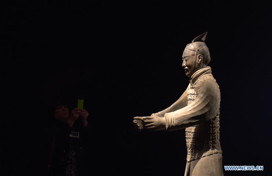 A terracotta warrior is seen during a press preview at the Virginia Museum of Fine Arts (VMFA) in Richmond, Virginia, the United States, on Nov. 15, 2017. Titled &apos;Terracotta Army: Legacy of the First Emperor of China,&apos; the exhibition features more than 130 artifacts, including 10 life-size terracotta warriors. The exhibition will be at VMFA from Nov. 18 to March 11, 2018. (Xinhua/Yin Bogu) 
