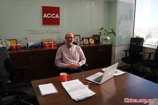 Martin Turner, former president of the Association of Charted Certified Accountants (ACCA), talks on the future of the accounting industry while being interviewed by China.org.cn on Nov. 30, 2017 in Beijing. [Photo by Wu Jin /China.org.cn]