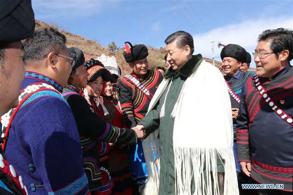Chinese President Xi Jinping, also general secretary of the Communist Party of China Central Committee, visits the homes of impoverished villagers of the Yi ethnic group who live deep in the Daliang Mountains of Zhaojue County, Sichuan Province in southwest China, Feb. 11, 2018. Xi asked the villagers about their lives and discussed poverty alleviation with local officials and villagers on Sunday. [Xinhua/Ju Peng]