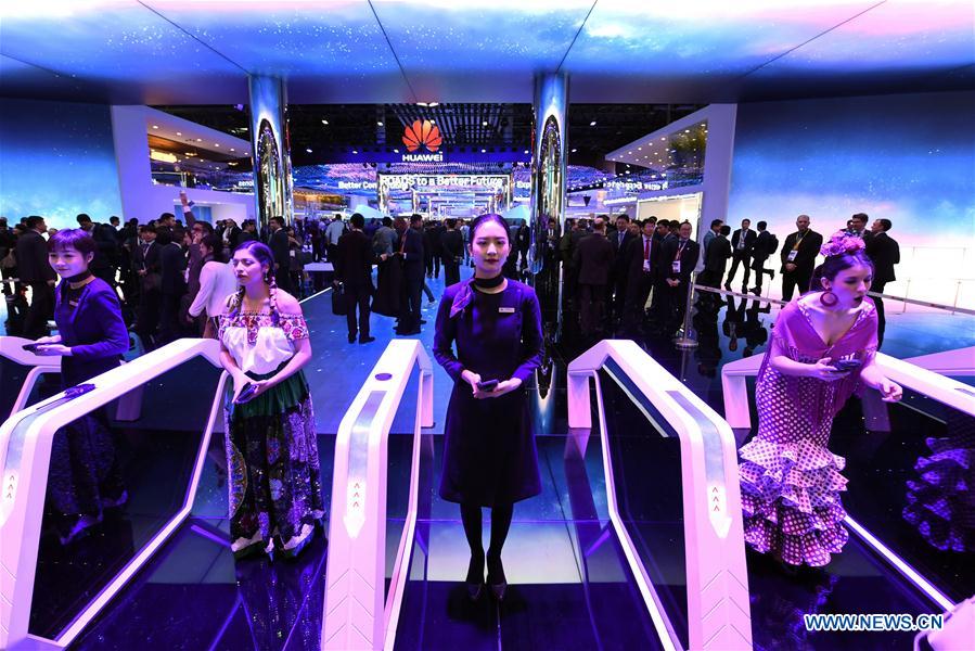 People visit Huawei's booth during the first day of the 2018 Mobile World Congress (MWC) in Barcelona, Spain, on Feb. 26, 2018. [Photo/Xinhua]