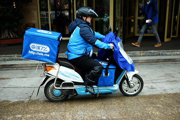 A delivery man for Ele.me in Hangzhou, capital of Zhejiang province. [Photo/China Daily]