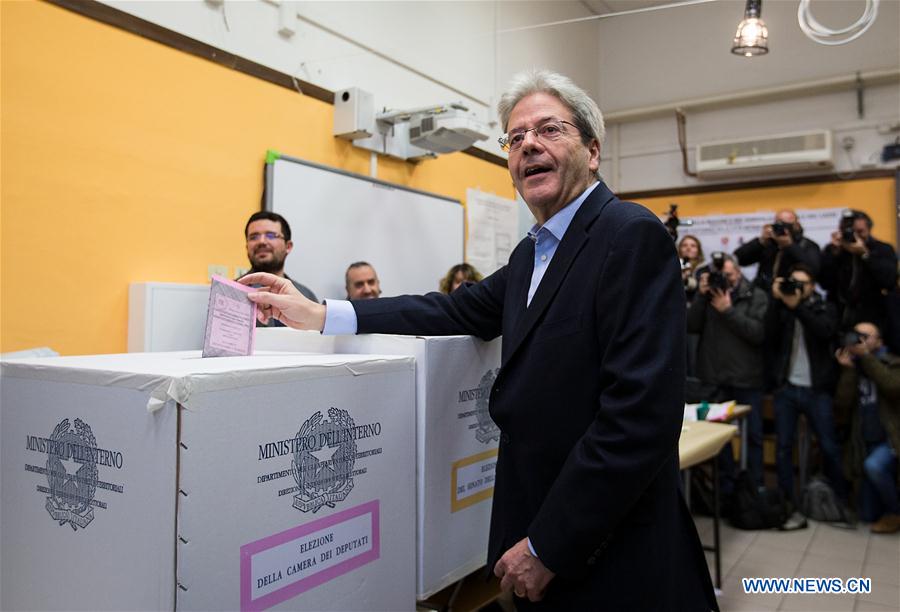 Italian Prime Minister Paolo Gentiloni casts his vote at a polling station in Rome, Italy, March 4, 2018. [Photo/Xinhua]