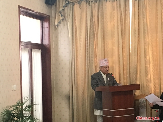 Leela Mani Paudyal, Nepalese ambassador to China, delivers his opening remarks in a seminar on investment opportunities in hydropower projects in Nepal held in Beijing on March 23. [Photo by Cui Can/China.org.cn]