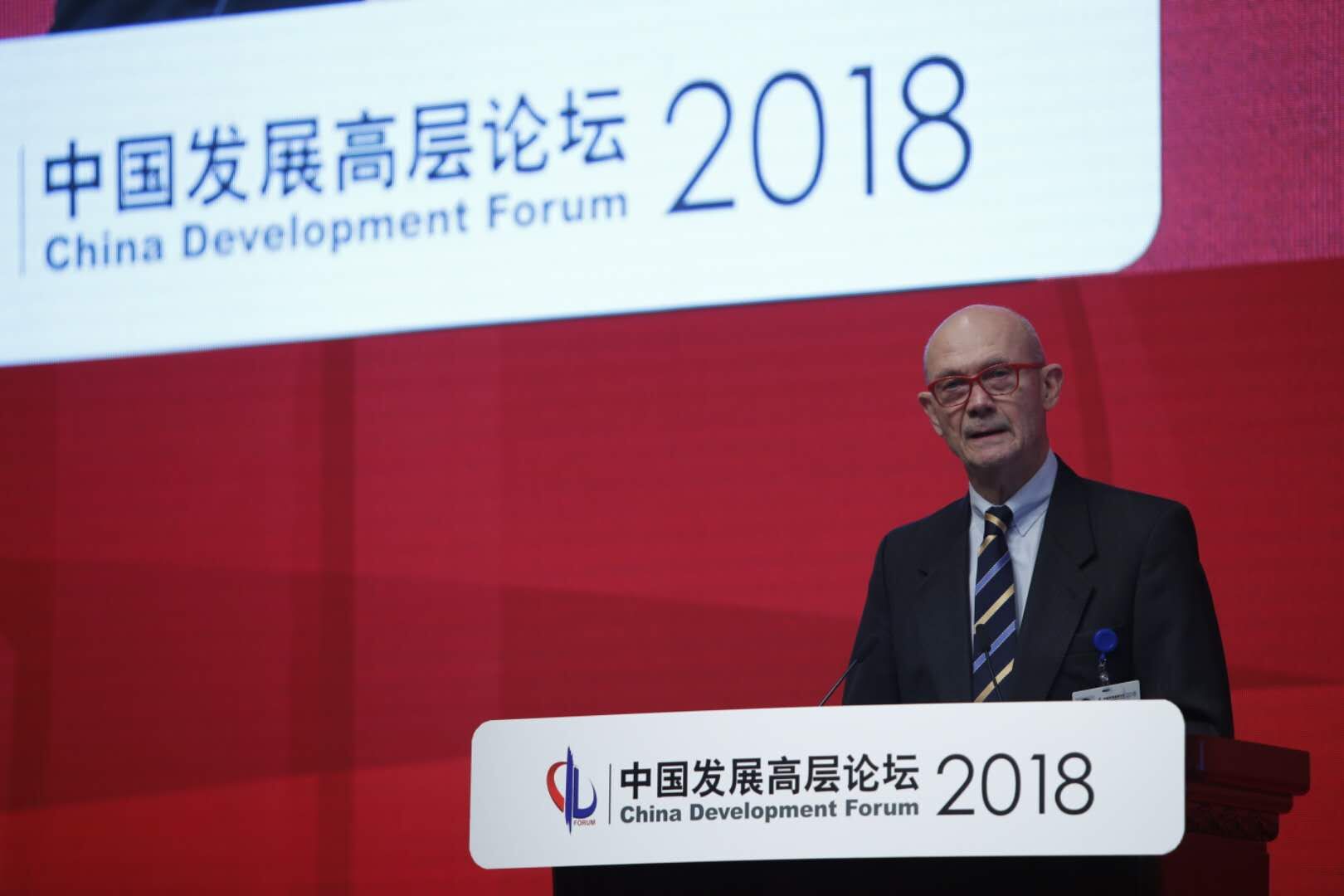Former WTO Secretary-General Pascal Lamy, speaks at the Economic Summit of the annual China Development Forum in Beijing on March 24, 2018. [Photo by Yang Jia / China.org.cn]