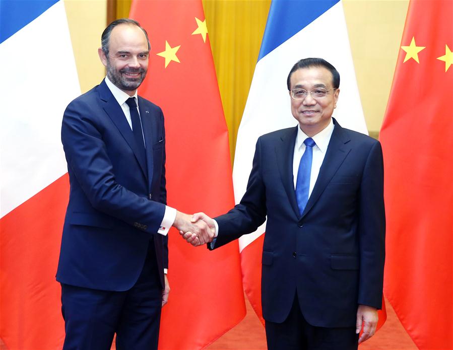 Chinese Premier Li Keqiang (R) holds talks with French Prime Minister Edouard Philippe at the Great Hall of the People in Beijing, capital of China, June 25, 2018. [Photo/Xinhua]