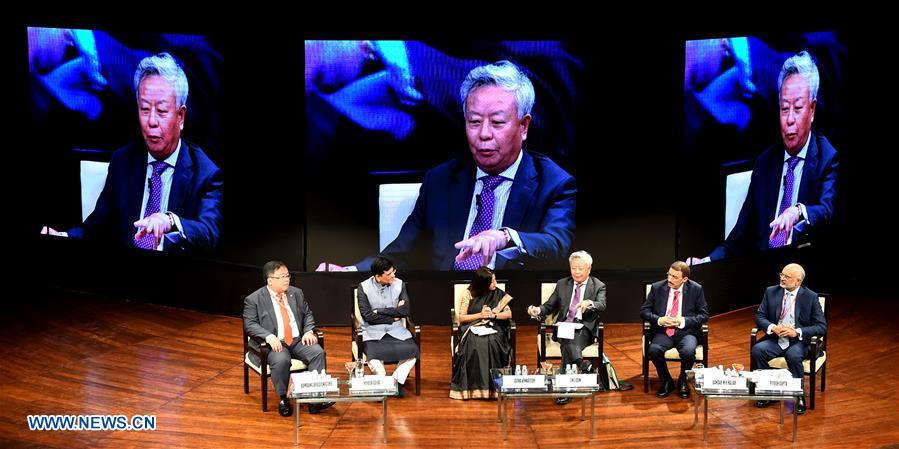 President of the Asian Infrastructure Investment Bank (AIIB) Jin Liqun (3rd R) speaks at the third annual meeting of AIIB in Mumbai, India, June 25, 2018. [Photo/Xinhua]
