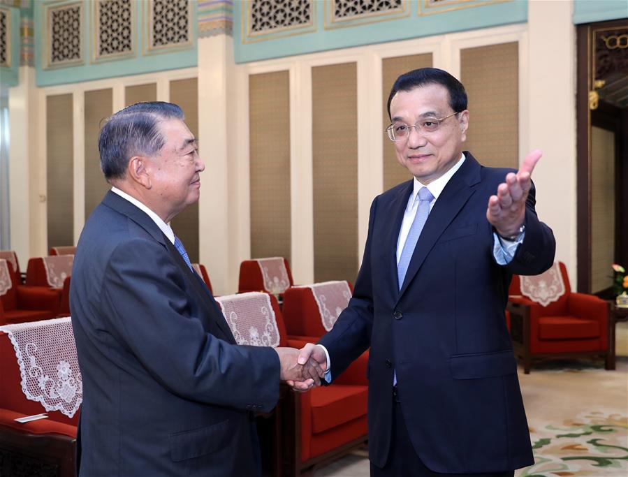 Chinese Premier Li Keqiang (R) meets with Tadamori Oshima, speaker of the House of Representatives of the Japanese parliament in Beijing, capital of China, July 24, 2018. [Photo/Xinhua]
