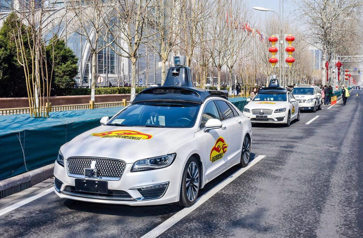 Baidu's Apollo driverless cars conduct road tests in Beijing. [Photo/China Daily]
