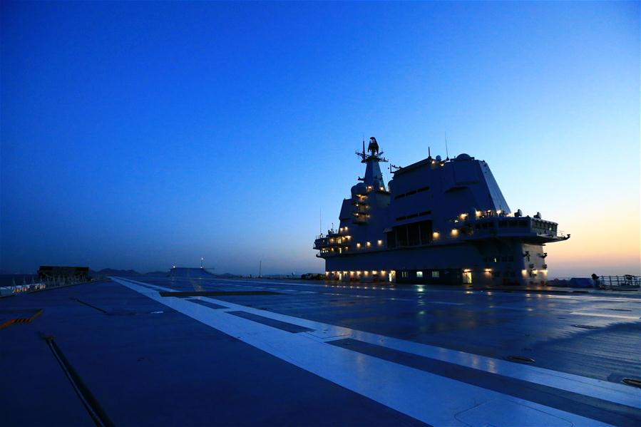 China's second aircraft carrier returns to dock at Dalian Shipyard in northeast China's Liaoning Province, on May 18, 2018 after its first sea trials. [Photo/Xinhua]