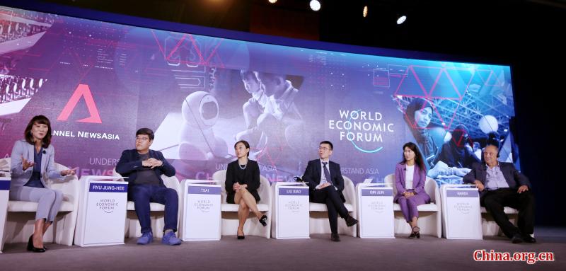 The panel discussion themed on “China's Financial Opening” is held during the Summer Davos on Sept 18, 2018 in Tianjin. [Photo by Gao Zhan/China.org.cn]
