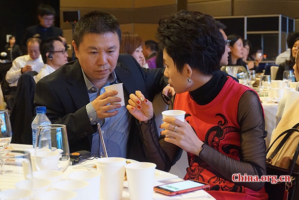 Chinese tea dealers exchange views on Indian tea at the event to promote Indian tea exports to China in Beijing on Oct. 24, 2018. [Photo by Huang Shan/China.org.cn]