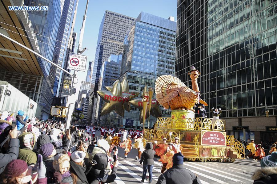 Millions brave frigid cold to watch Thanksgiving parade in NYC China