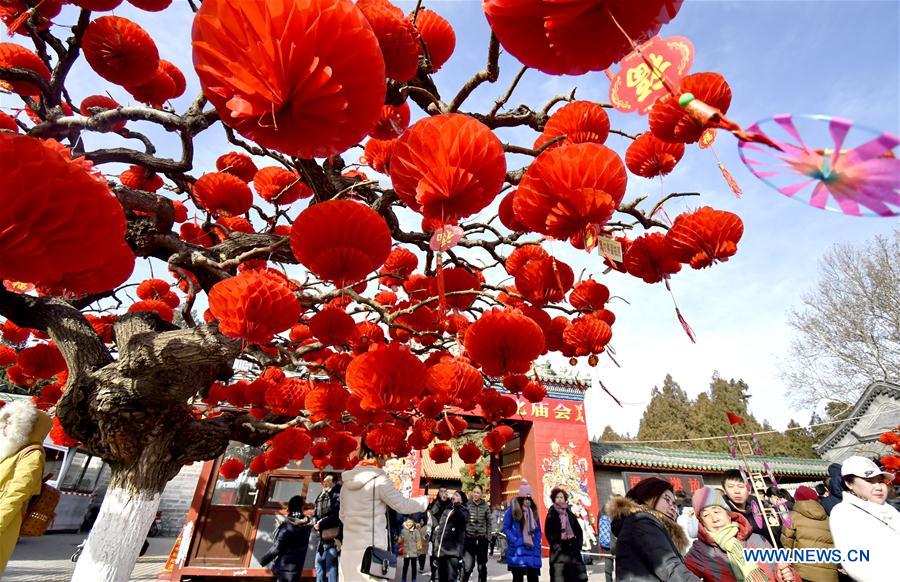 Temple Fair Held To Celebrate Spring Festival At Ditan Park In Beijing 