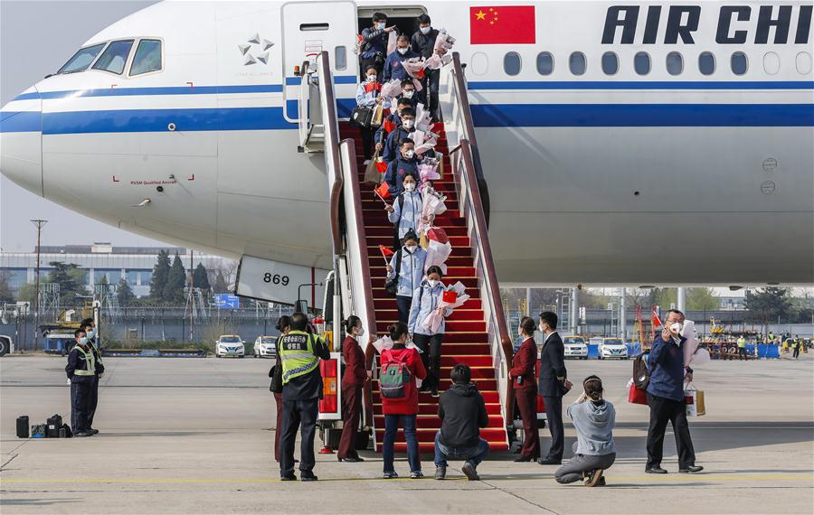 Medical Workers Return To Beijing After Aiding Hubei In Fight Against