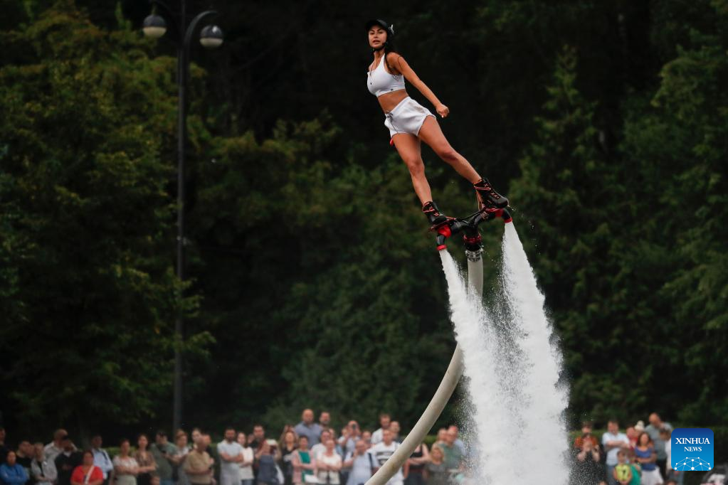 People enjoy performances during hydroflight festival in Mosc