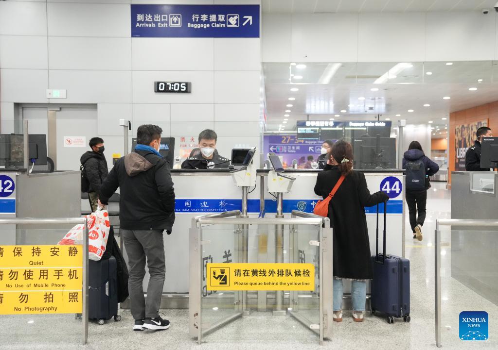 Inbound Passengers Arrive In Shanghai After China Enters New Phase Of 