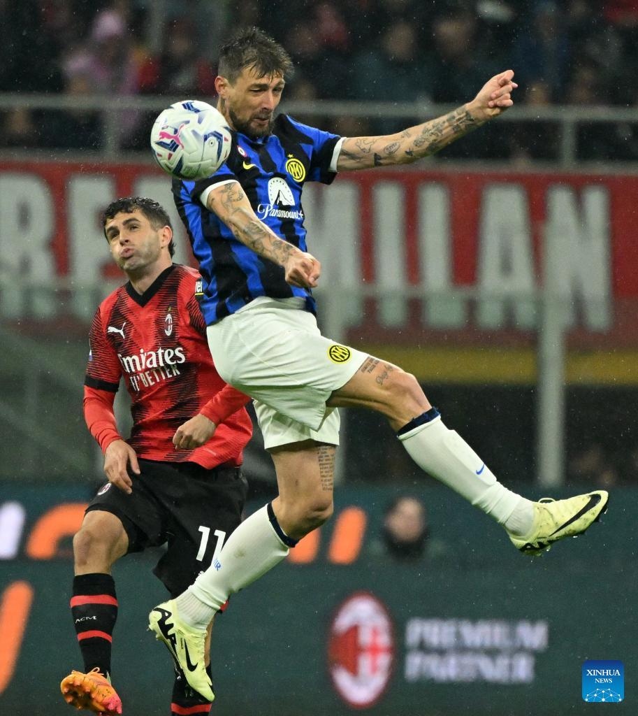 Inter secure Serie A title in heated win over Milan