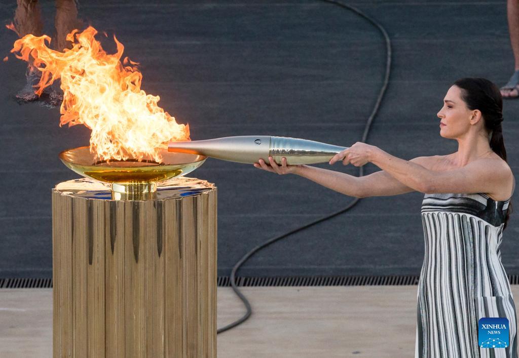 Olympic flame sets sail from Greece to France