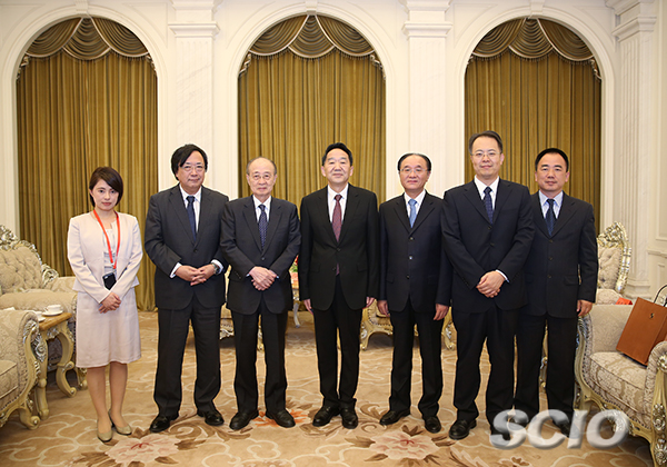 Jiang Jianguo (C), deputy head of the Publicity Department of the CPC Central Committee and minister of the State Council Information Office, meets with a delegation headed by Yasushi Akashi (3rd L), chairman of the Japanese Executive Committee of the Beijing-Tokyo Forum. [Photo by Jiao Fei/China SCIO]