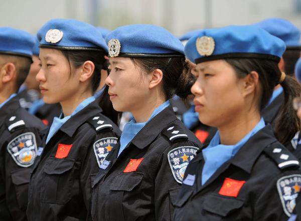 Chinese riot police squad in Haiti arrive in Beijing - China.org.cn