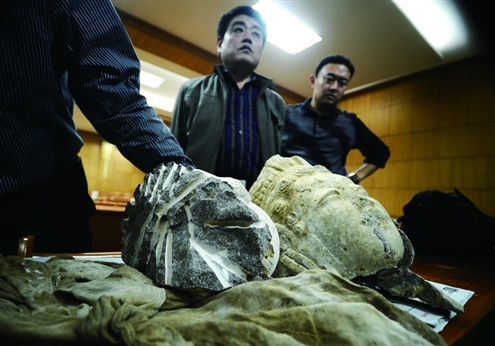 1,400-year-old Buddha heads recovered from thieves- China.org.cn