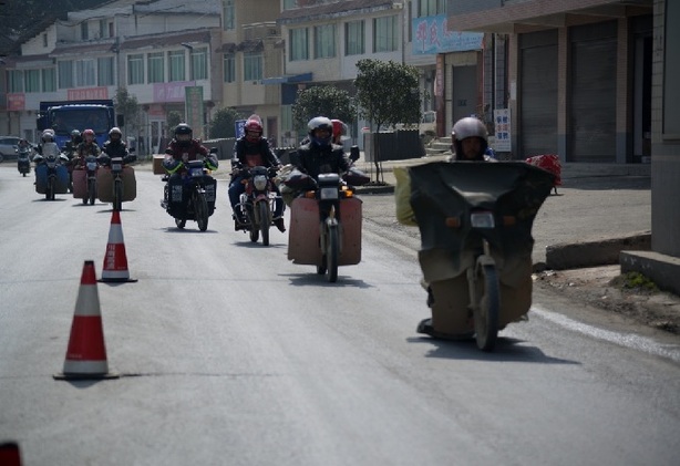 The rise and fall of the 'Motorcycle Army'- China.org.cn