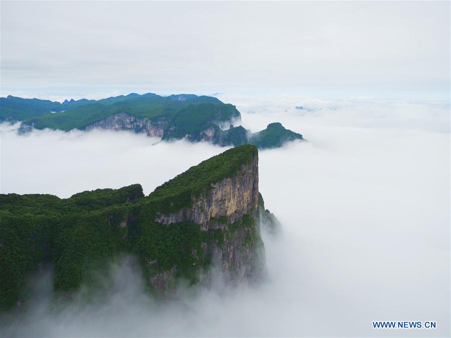 Scenery of Tianmen Mountain surrounded by fogs in Hunan - China.org.cn