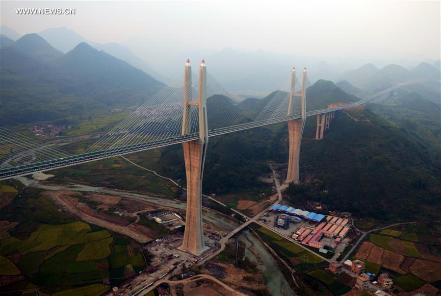 Cable-stayed bridge opens to trial traffic in C China- China.org.cn