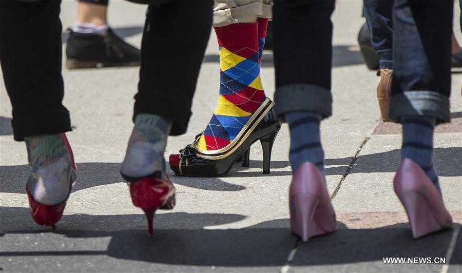 Walk a Mile In Her Shoes event held in Toronto- China.org.cn