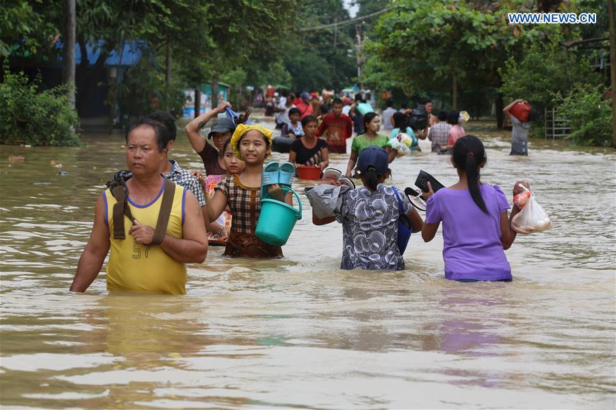 People affected by flood due to continuous heavy rainfall in Myanmar ...