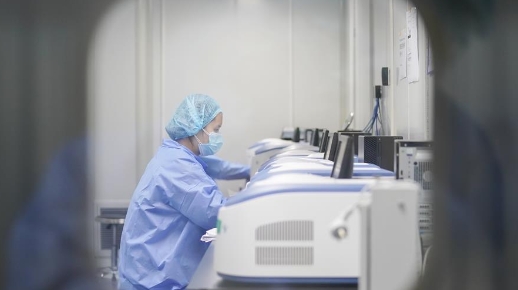 Staff members work at novel coronavirus detection lab in Wuhan- China ...