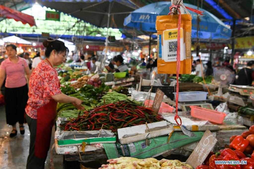 Markets bear witness to vigorous and happy life of local residents in ...