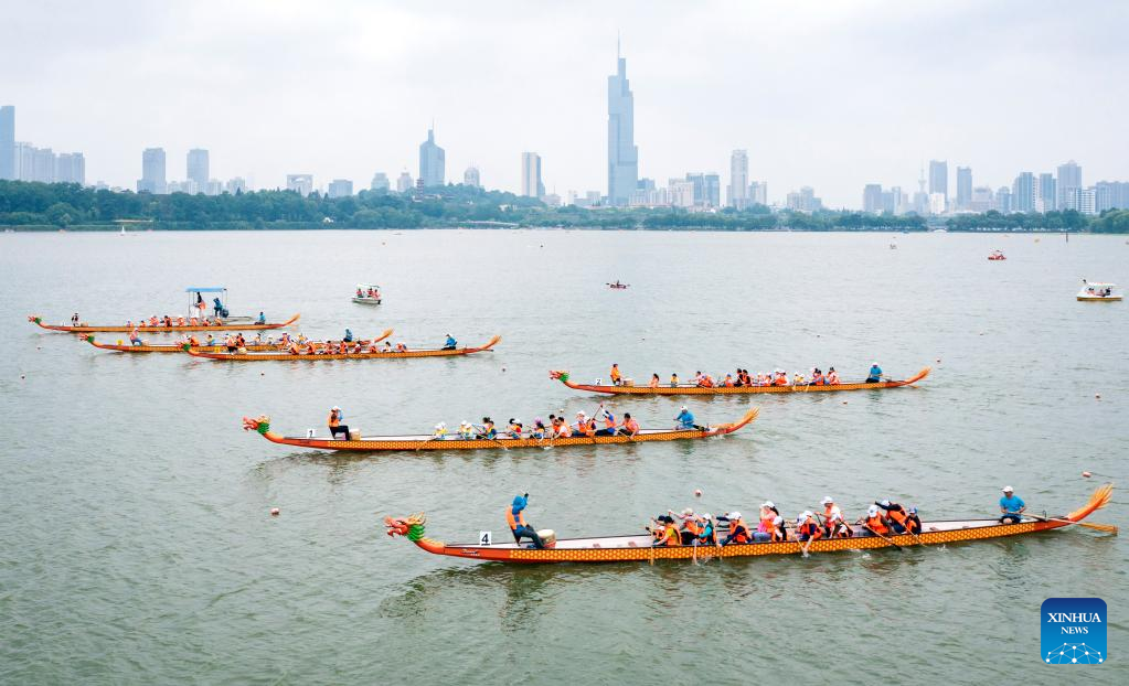 Dragon boat race held across China during holiday- China.org.cn